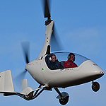 Fly in gyrocopter for about 25 minutes.